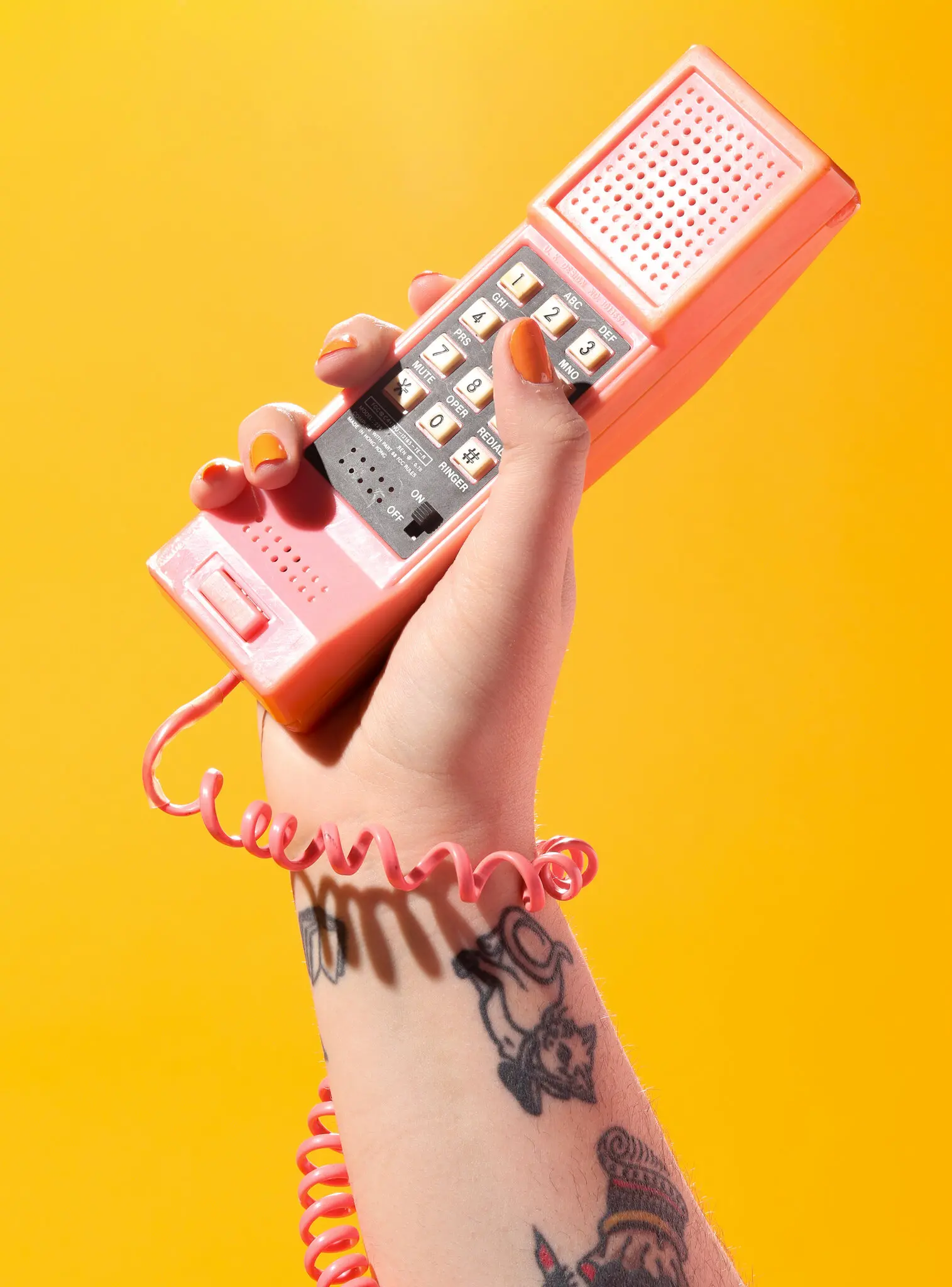 Ms. Karr’s orange phone was made as a promotional item for the 1986 film “Pretty in Pink.”